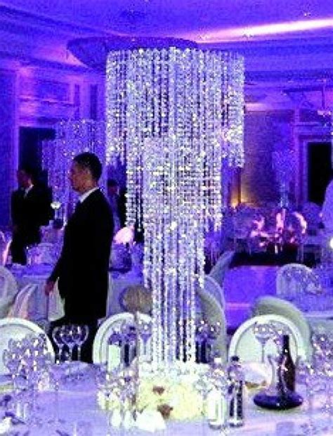 Pin By Megan Coley On Wedding Ideas Chandelier Centerpiece Bling