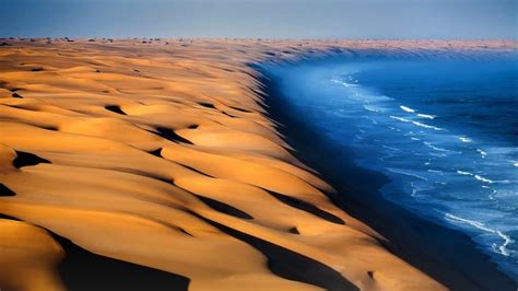 Dunes Of The Namib Desert Meet The Atlantic Ocean Namibia Africa