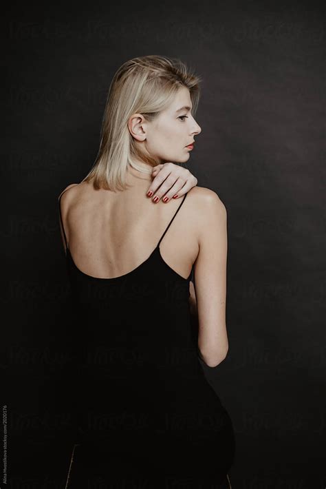 Beautiful Graceful Woman In Black Dress Del Colaborador De Stocksy