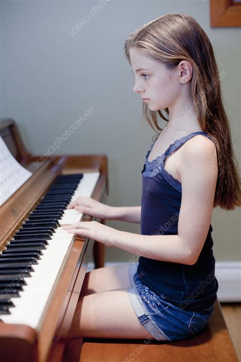 Girl Practicing Piano Indoors Stock Image F0045113 Science Photo
