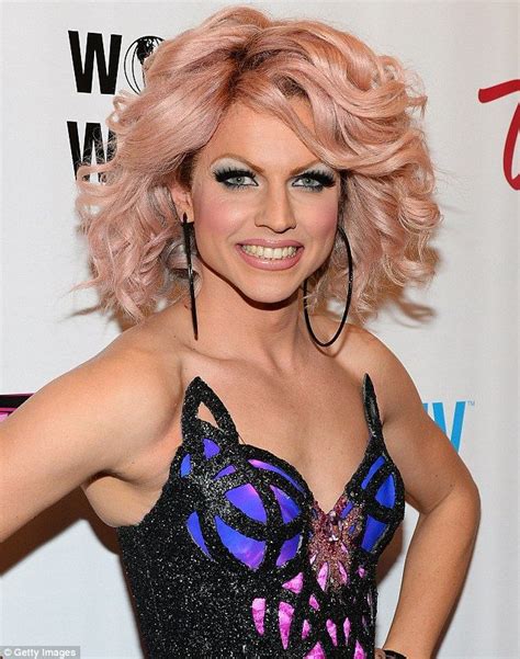 Courtney Act Has Heads Turning In A Popping Pink Corset Leotard Black Eye Makeup Blonde Curls