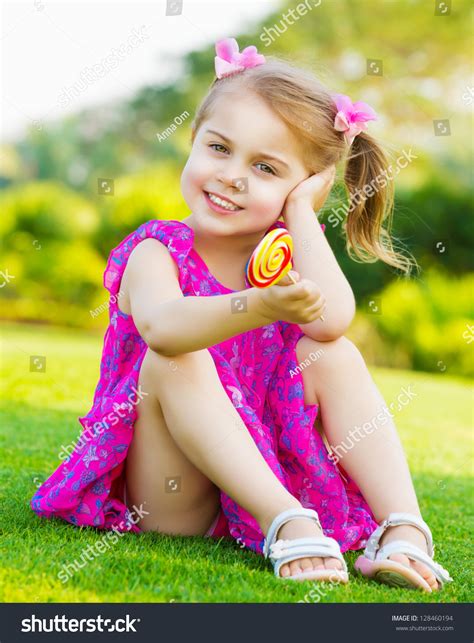 Photo Cute Little Girl Sitting On Stock Photo 128460194 Shutterstock
