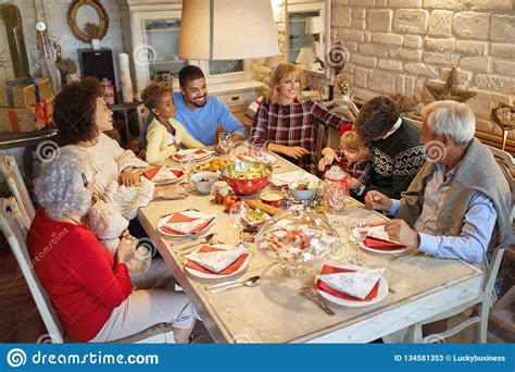 While israel's christmas dinners can feature a middle eastern variation of the roasted turkey we found out firsthand how hard it is to find a traditional american christmas dinner in japan. Family Celebrating Christmas Time And Enjoy Christmas Dinner Stock Image - Image of happiness ...