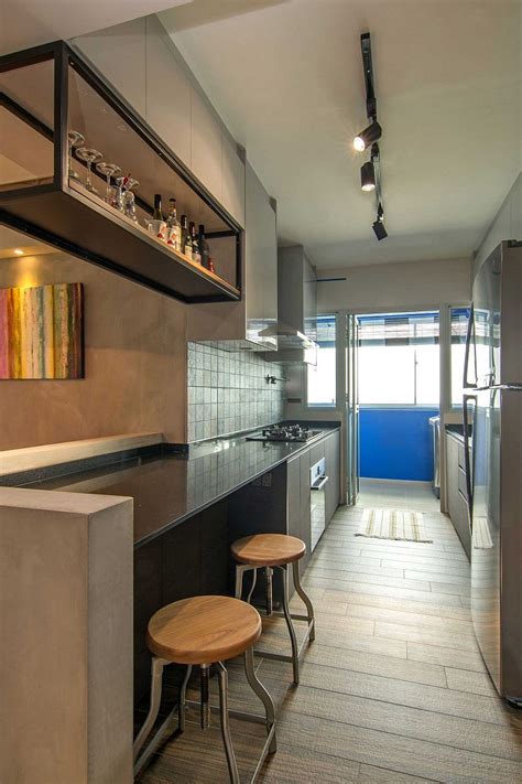 A series of oscillating bulbs, pop pastel hues and circular artwork offer signature elements. Home in Singapore: Space-Savvy Interior Laced with Industrial Elements | Contemporary kitchen ...