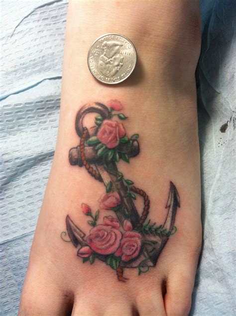 An anchor tattoo can have many meanings but in tatuantes we bring you the most common meanings to see if they fit you. Anchor Flower Tattoo Small | www.galleryhip.com - The ...