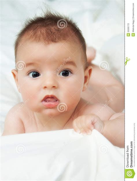 Closeup Portrait Of Cute Smiling Baby Boy Stock Photo