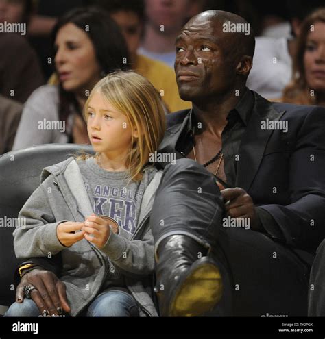 Seal Sits With His Daughter Leni During Nba Basketball Game With The