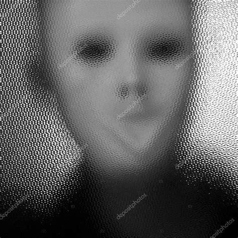Masked Figure Behind Glass Stock Photo By ©sirylok 5404873