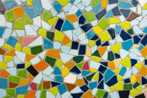 An Abstract Mosaic Design Made Up Of Multicolored Tiles