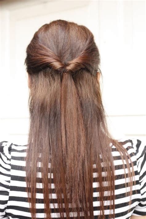 For best results, sweep your hair to a deep side parting. Quick half-up style for long straight hair tied by ...