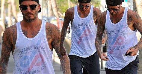 David Beckham Flashes His Huge Arms And Extensive Tattoos Again As He