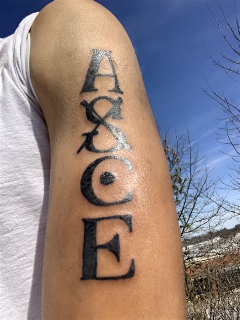 Ace had another tattoo on his upper left bicep that spells asce vertically. Just got Ace's tattoo yesterday : OnePiece