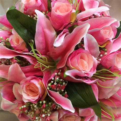 Check spelling or type a new query. A wedding bouquet of artificial silk roses and lily ...