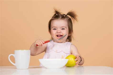 Cute Funny Babies Eating Baby Food Funny Smiling Baby Girl With Spoon