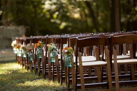 Loft ceremony with moss wall, candles and wooden folding chairs. Fruitwood Folding Chairs | Athens, Atlanta, & Lake Oconee ...