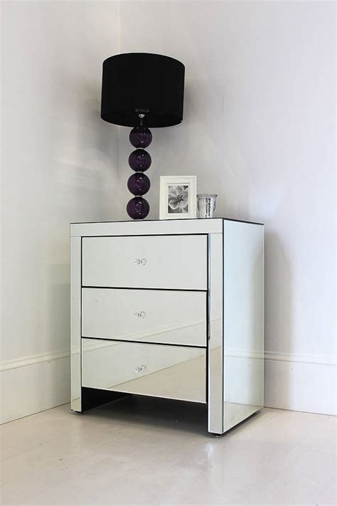 Things are handy to reach on or inside your bedside table. wide mirrored bedside table by out there interiors ...