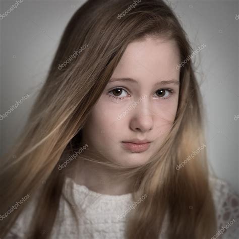 Young Teenage Girl Crying — Stock Photo © Heijo 61322805
