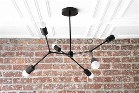 The intensity of the light and the color and use your imagination to create your mid century modern ceiling light to complement or contrast with your decor. Modern Chandelier Black Mobile Light Mid Century Lighting ...