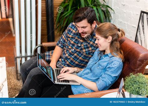 Relaxing Couple Watching Laptop Chilling On Sofa Stock Image Image Of