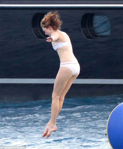 Lily Cole Almost Reveals Too Much After Losing Her Bikini Top While