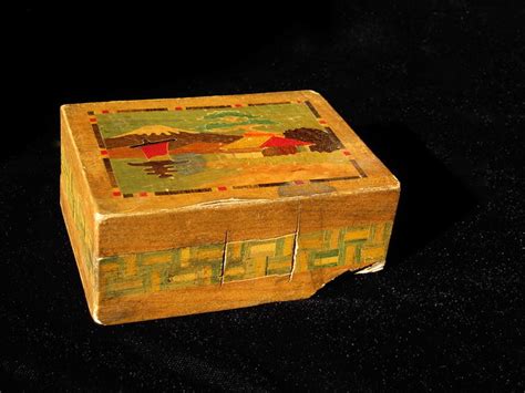 Insert the point of the nail file, letter opener or one blade of the scissors into one corner, between the lid and the box, so that the flat part of the blade is parallel to the edge of the box. Chinese Puzzle Box | Flickr - Photo Sharing!