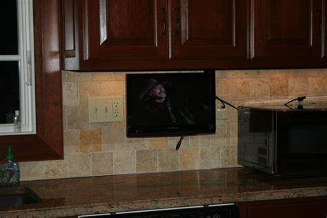 An under cabinet tv for the kitchen saves more space than their counter top cousins, conserving on needed work space. small kitchen smart tv | Small TV for Kitchen | Pinterest ...