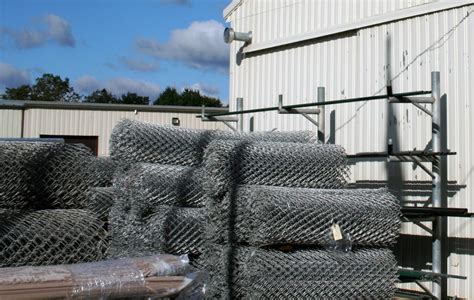 Chain link fencing is relatively easy to install. Services - Dewitt Fence | Lansing Fence Company
