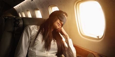 How To Sleep Better On A Plane Huffpost