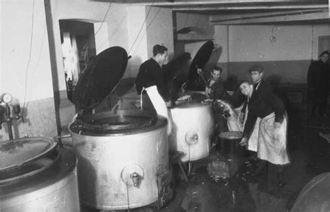 Work In The Zeilsheim Camp Kitchen Pour Food From Large Vats