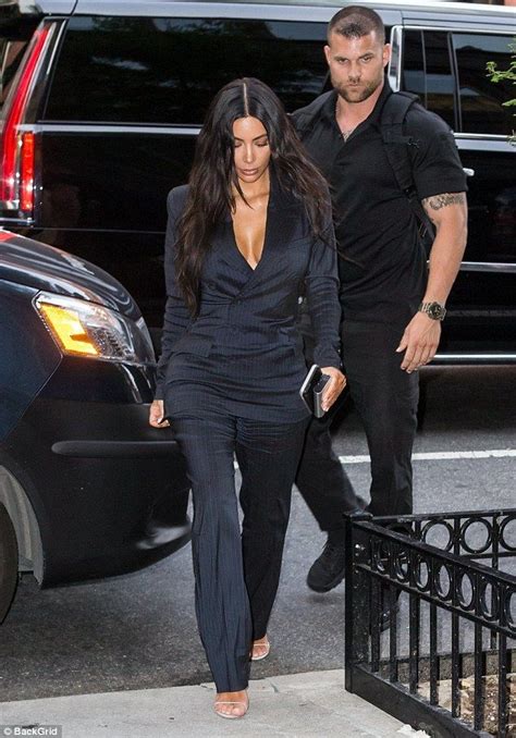 Kim Kardashians Bodyguard Puts His Hand Near Her Bountiful Backside