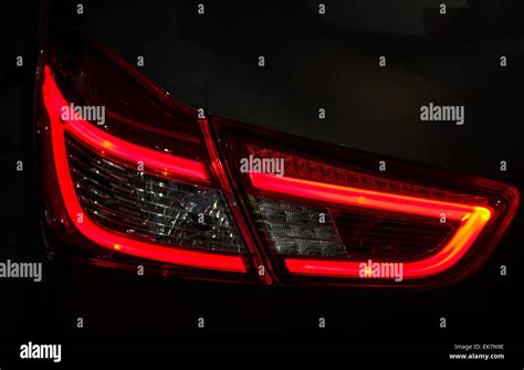 Detail Of A Modern Car Led Tail Lights On Dark Background Stock Photo