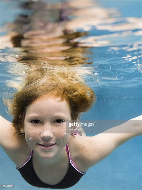 Portrait Of A Girl Swimming Underwater High Res Stock Photo Getty Images