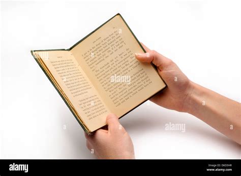 Hand Holding Old Childrens Book Stock Photo Alamy