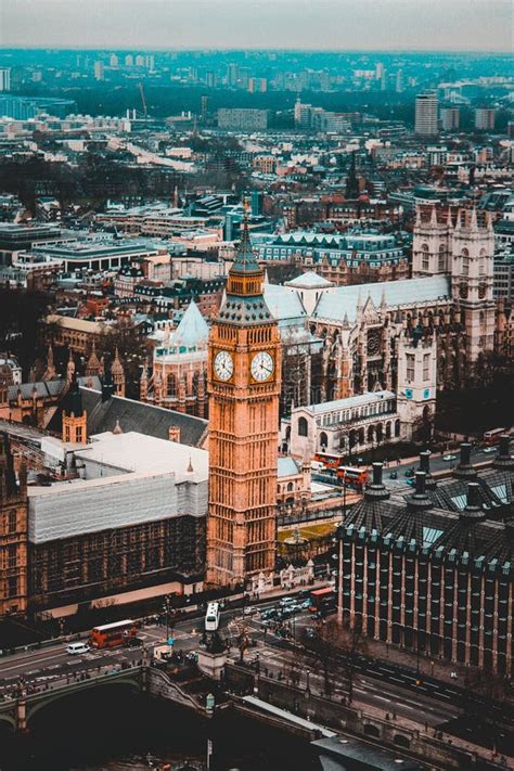 Vertical Aerial Shot Of A Cityscape In London With Big Ben And High