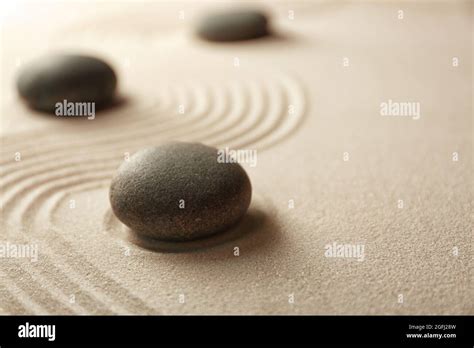 Japanese Zen Garden Pebbles On A Sand Stock Photo Alamy