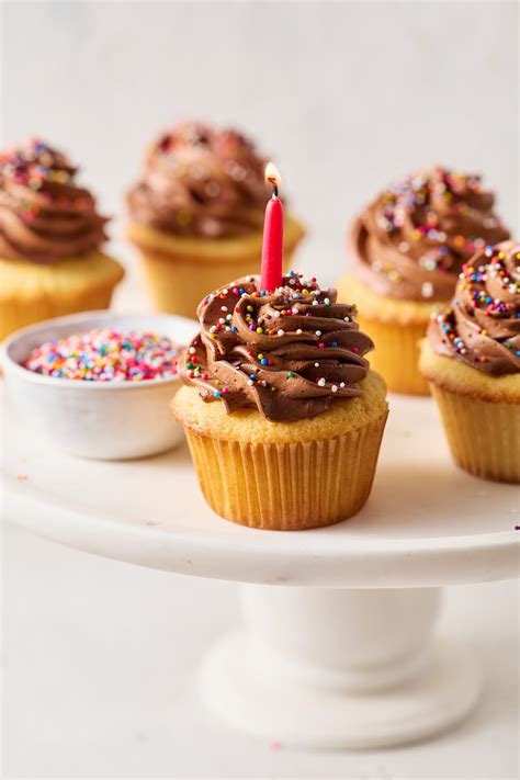 Yellow Cupcakes With Chocolate Frosting Baker By Nature
