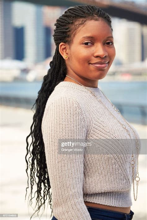 Black Woman Posing At Waterfront Photo Getty Images