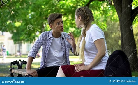 Teenagers Arguing In Park Break Up Because Of Misunderstanding
