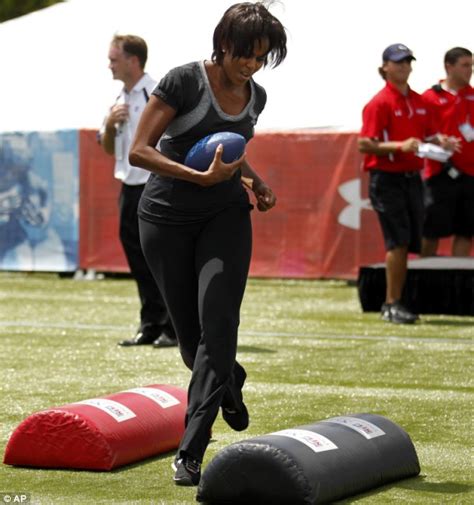 First Lady Michelle Obama Shows Off Her Moves On The Sports Field