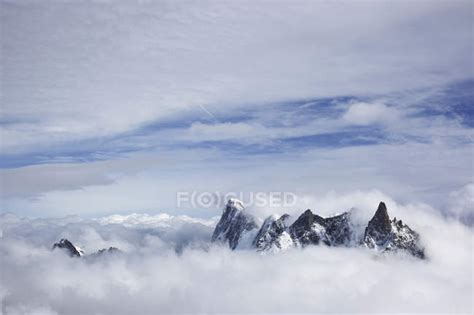 Mountain Peaks Above Clouds — Nature Alpine Stock Photo 164932634