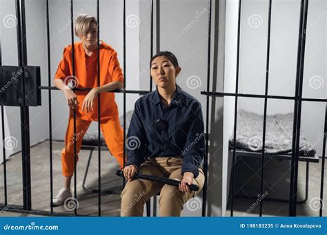 A Normal Day In A Women S Prison A Female Warden Is On Guard For A Female Criminal Stock Image