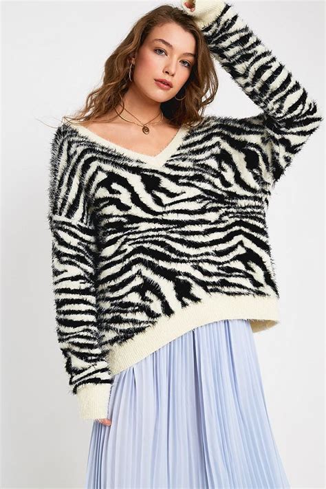 Slouchy sweater from house of sunny in an abstract colorblock knit. House Of Sunny Zebra Print V-Neck Jumper | Zebra print ...
