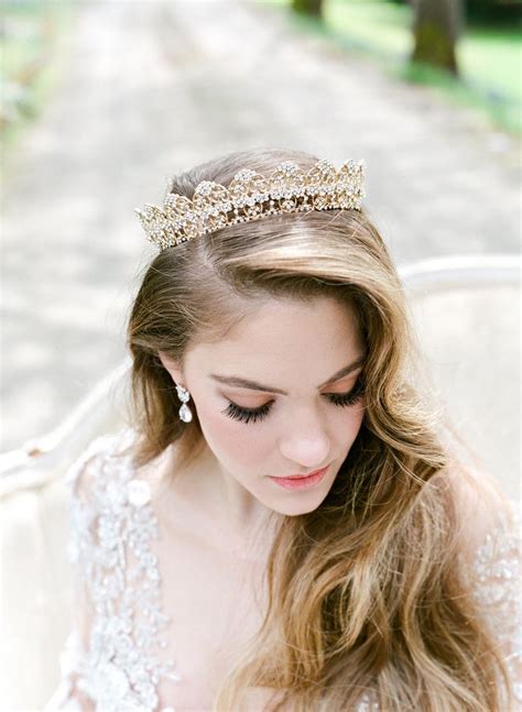 A Woman Wearing A Tiara On Her Head