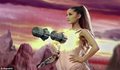 Ariana Grande Blasts Space Aliens With Missiles From Her Chest In Racy New Video Daily Mail Online