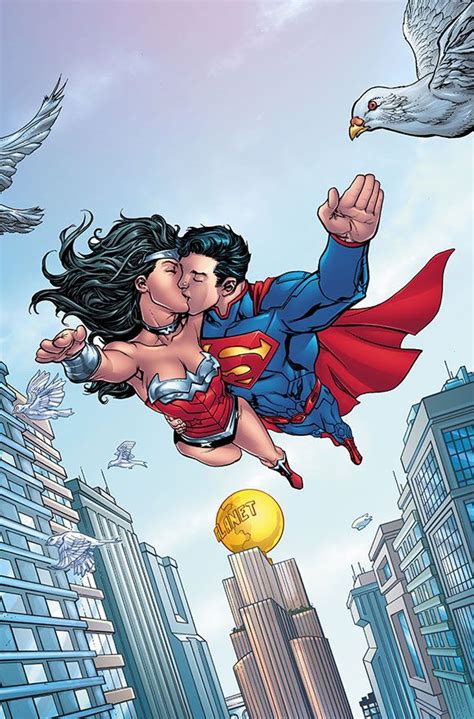 Superman And Wonder Woman Flying Through The Air Over Cityscape With
