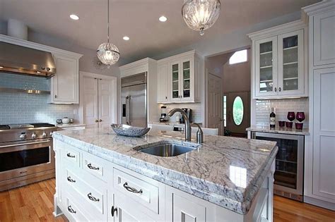 Maybe you would like to learn more about one of these? White kitchen with Bianco Romano granite countertops ...