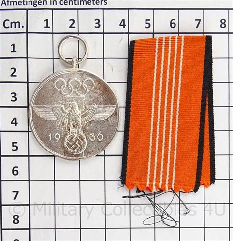 Sie waren eigentlich für 2020 geplant, mussten wegen der. WO2 Duitse Olympischen Spielen 1936 medaille met lint ...