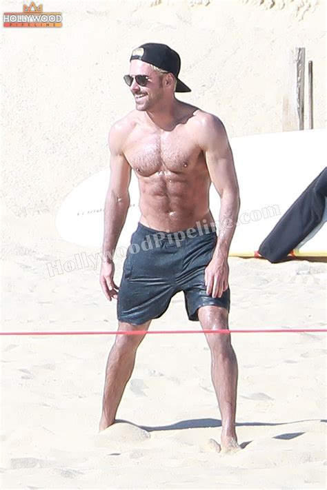 Zac efron has been the focus of fitness for his baywatch body transformation. Newly Blonde Zac Efron on the Beach: Fit, Furry and F ...