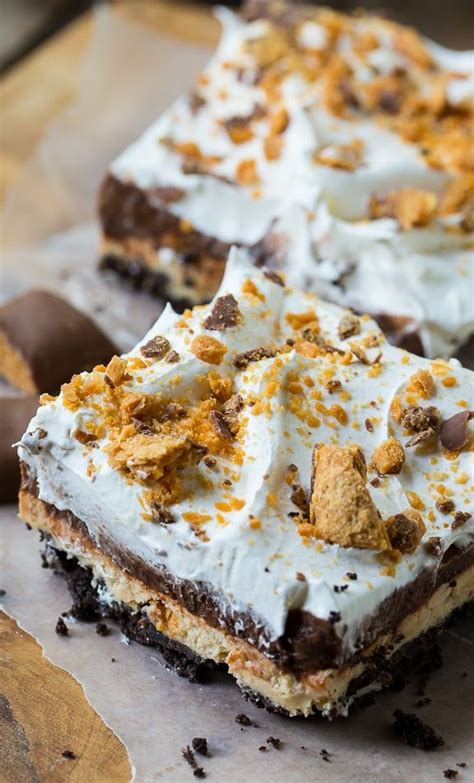 This butterfinger, chocolate, and peanut butter lush is pure heaven. Butterfinger Lush | Desserts, Delicious desserts ...