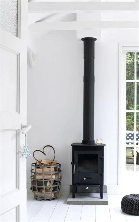 Dru classic cast iron stoves are constructed in traditional scandinavian style to withstand the harshest the range includes freestanding wood stoves with spectacular modern designs and high energy. Modern Scandinavian Wood Stoves - Wood Burning Stoves ...